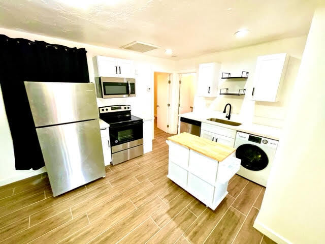 Building Photo - Renovated in the heart of Roosevelt district WITH LARGE PRIVATE GARAGE!!!