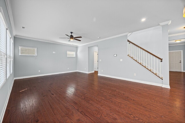 Building Photo - Classic finishes paired with an open, versatile layout!