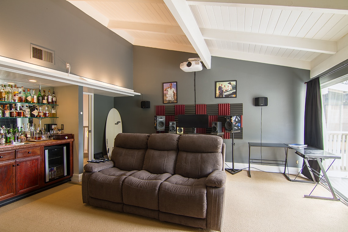 Large room with access to its own balcony works great as an entertainment area. - 2838 Luciernaga St