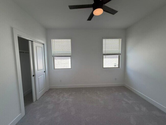 Building Photo - Move-in ready and like-new! Washer, dryer, and refrigerator Included.