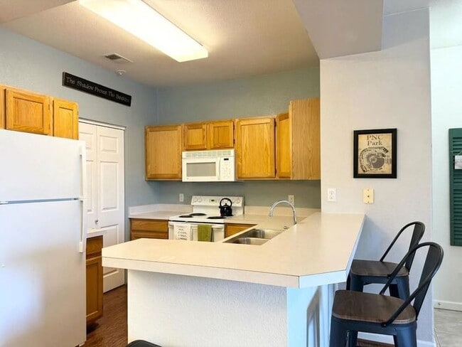 Building Photo - 2 Bedroom, 2 Bathroom Condo In Fort Collins with Pool and Clubhouse Access! Great Location Harmon...