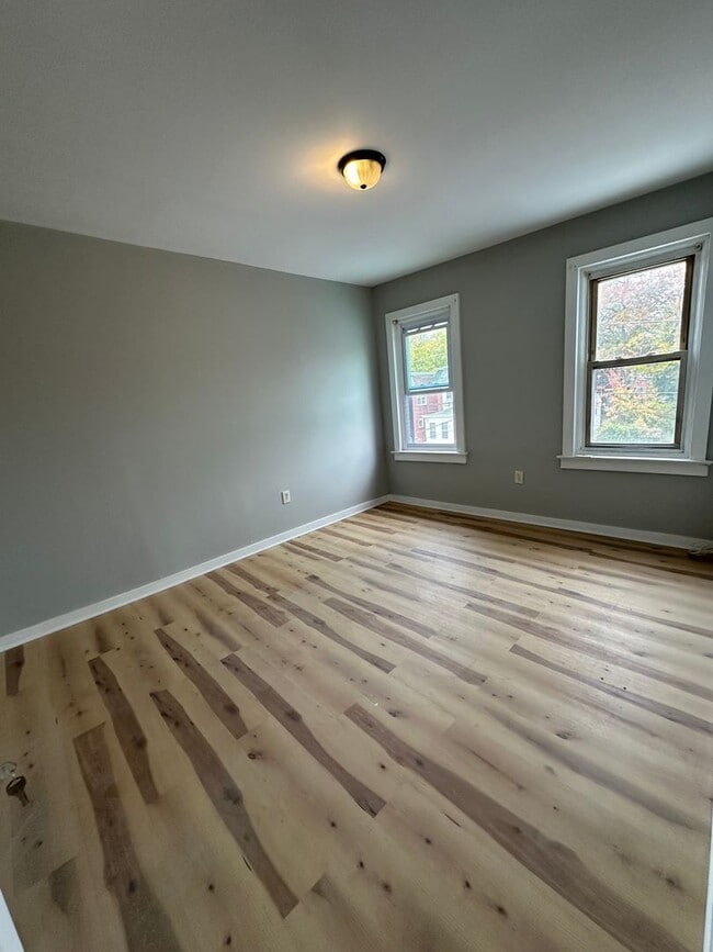 Building Photo - Beautifully Renovated 3-Bedroom Twin Home with Spacious Layout & Fenced Yard