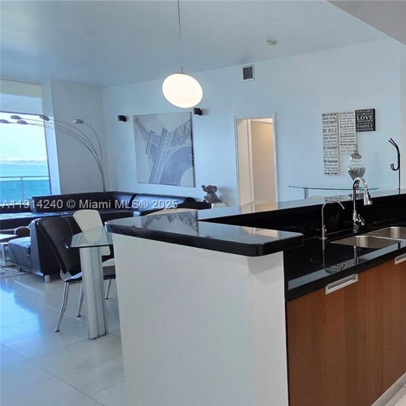 Modern waterfront living in North Bay Village. Spacious 3-bedroom, 2-bath condo offering 1,735 sq ft - 7901 Hispanola Ave