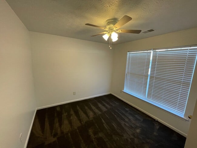 Building Photo - Spacious 4 Bedroom Townhome in Jackson with fenced backyard!