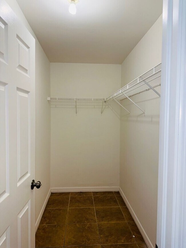 Building Photo - Experience this Cape Coral 3 bedroom 2 bath corner duplex with 1 car garage and screened in lanai.