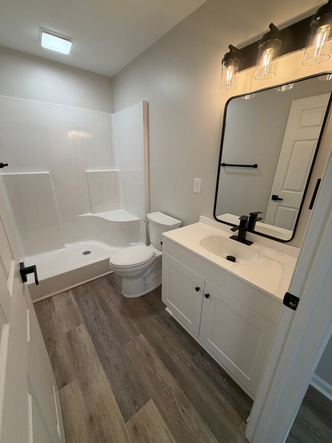 Building Photo - Open concept, location and easy living!