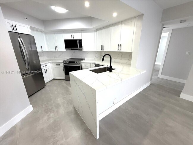 Building Photo - 6767 Collins Ave