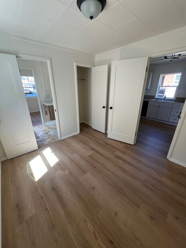 Building Photo - CHARMING! Remodeled 2 Bedroom home with storage and yard