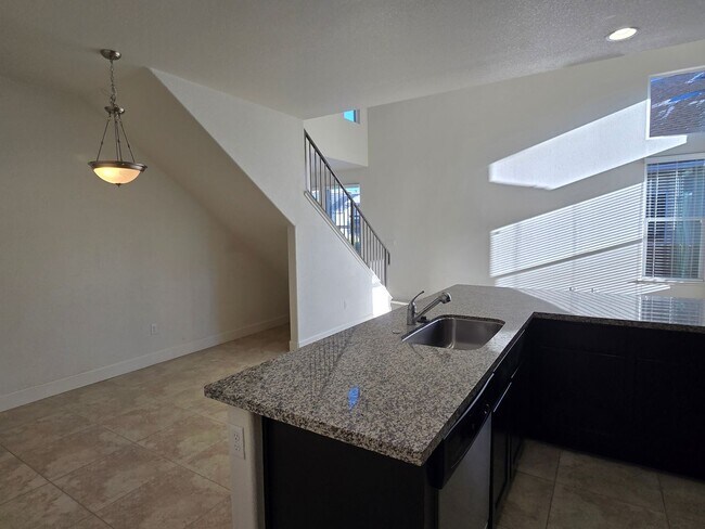 Building Photo - Fabulous home in a gated community with ov...