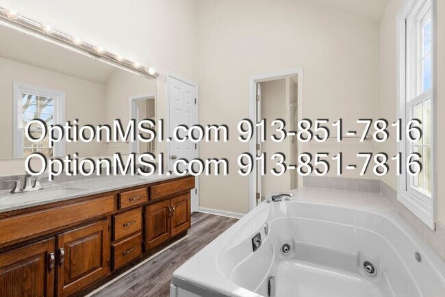 Building Photo - Welcome home to this charming two-story in South Woods subdivision