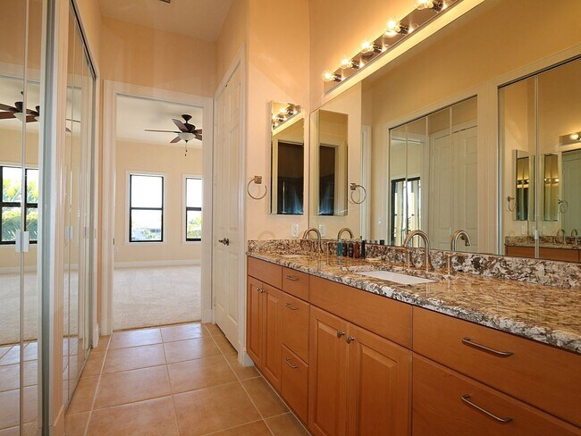 Building Photo - BEAUTIFUL 3-BEDROOM  WATERFRONT CONDO WITH BOAT SLIP AND HEATED POOL