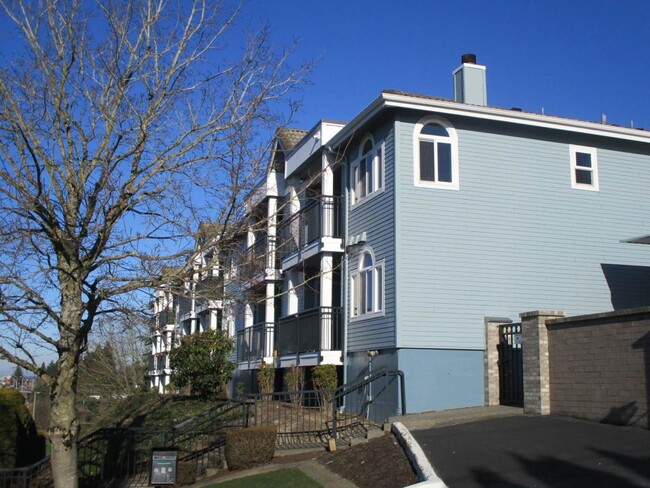 Building Photo - Charming Corner Condo with Puget Sound Views