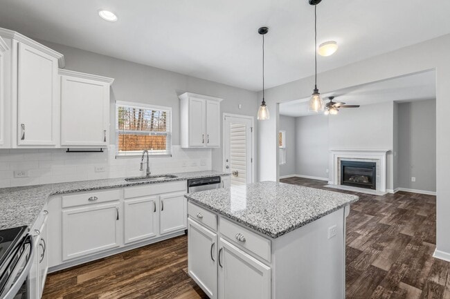 Building Photo - Newer Home in Reedy Fork, SS Appliance, Granite Counter-tops, Island, Office, Den, FP, Loft, Gara...