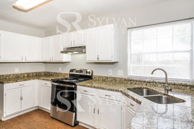 Building Photo - Turn the key. Enter. Smile. Repeat every day!