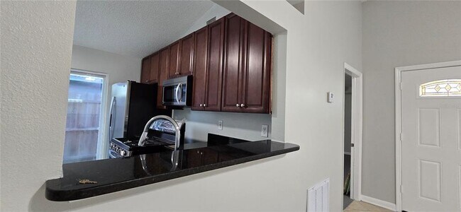 Building Photo - 9414 Dearmont Ave