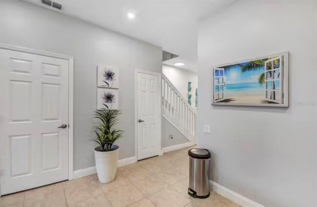 Building Photo - 8117 Princess Palm Ln