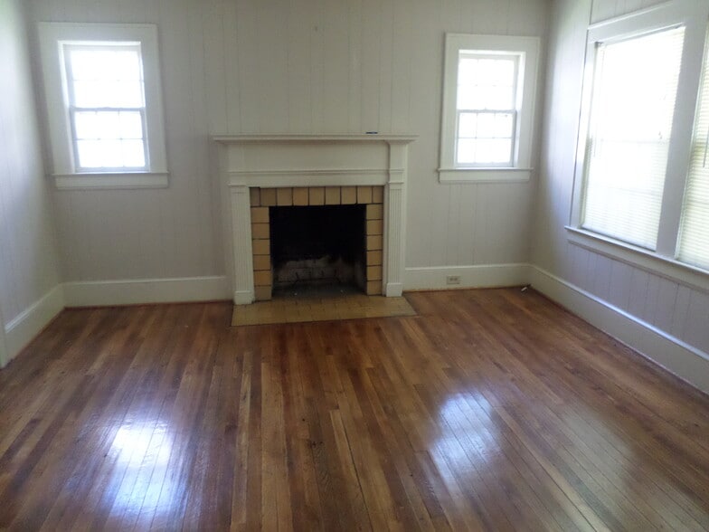 Living Room with gorgeous Hardwood floors and Fireplace - 210 Edward St