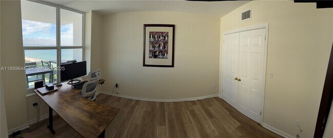 Building Photo - 5001 Collins Ave