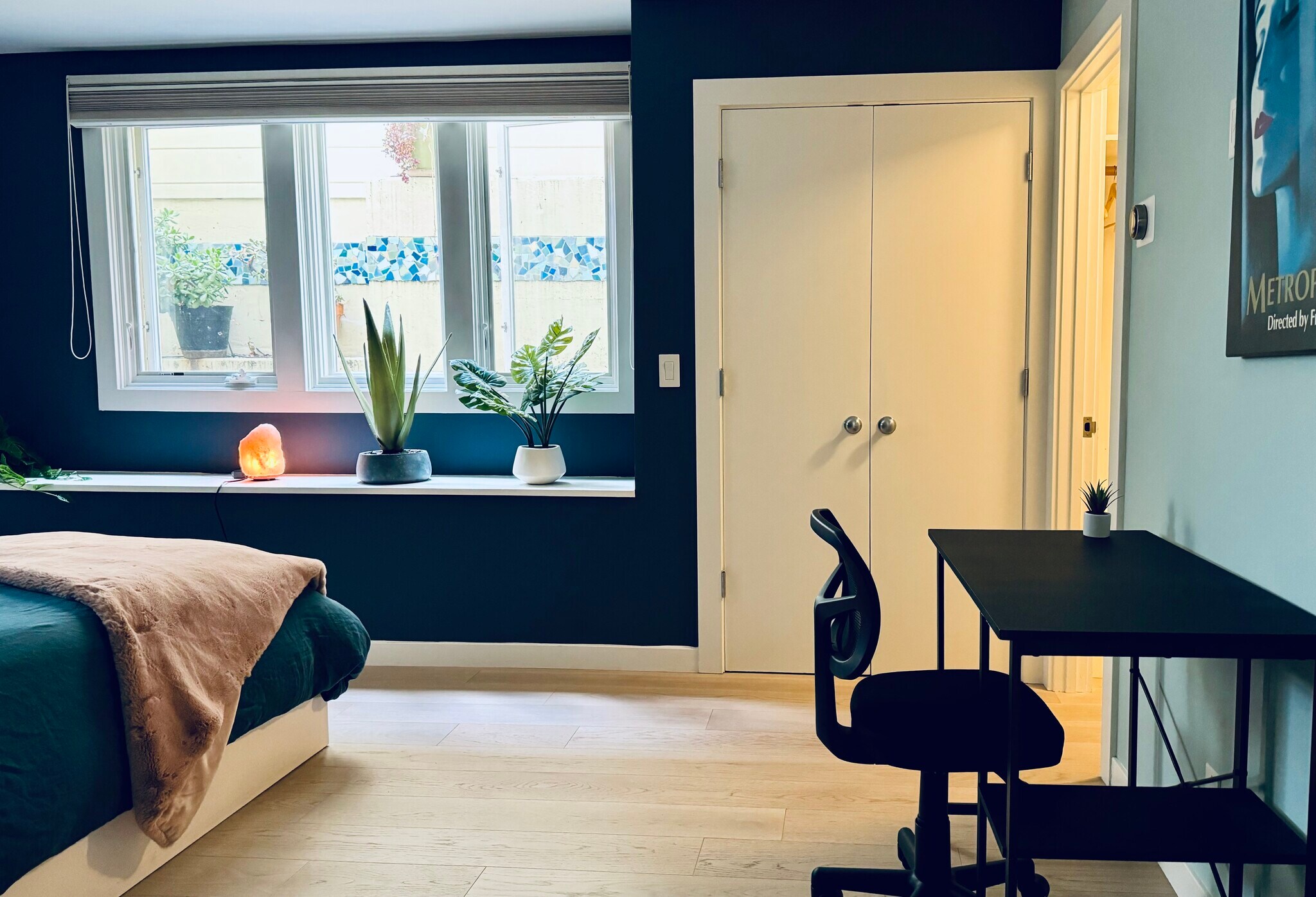 Large main bedroom with walk-in closet, black-out blinds, and large window seat - 328 Harriet St