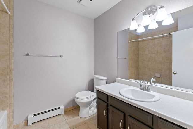 Building Photo - Students Welcome! Spacious 2-Bedroom Condo with Garage and Basement