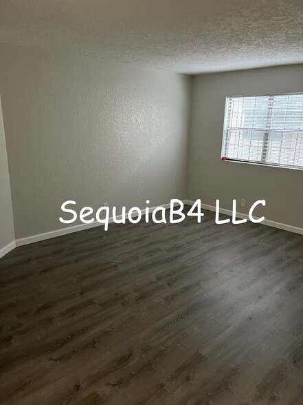 Living area coming from kitchen - 6041 Sequoia Rd NW