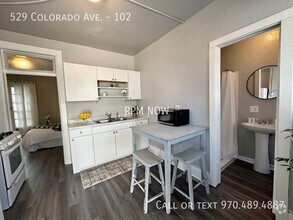 Building Photo - All Utilities Included.  Studio with Downt...