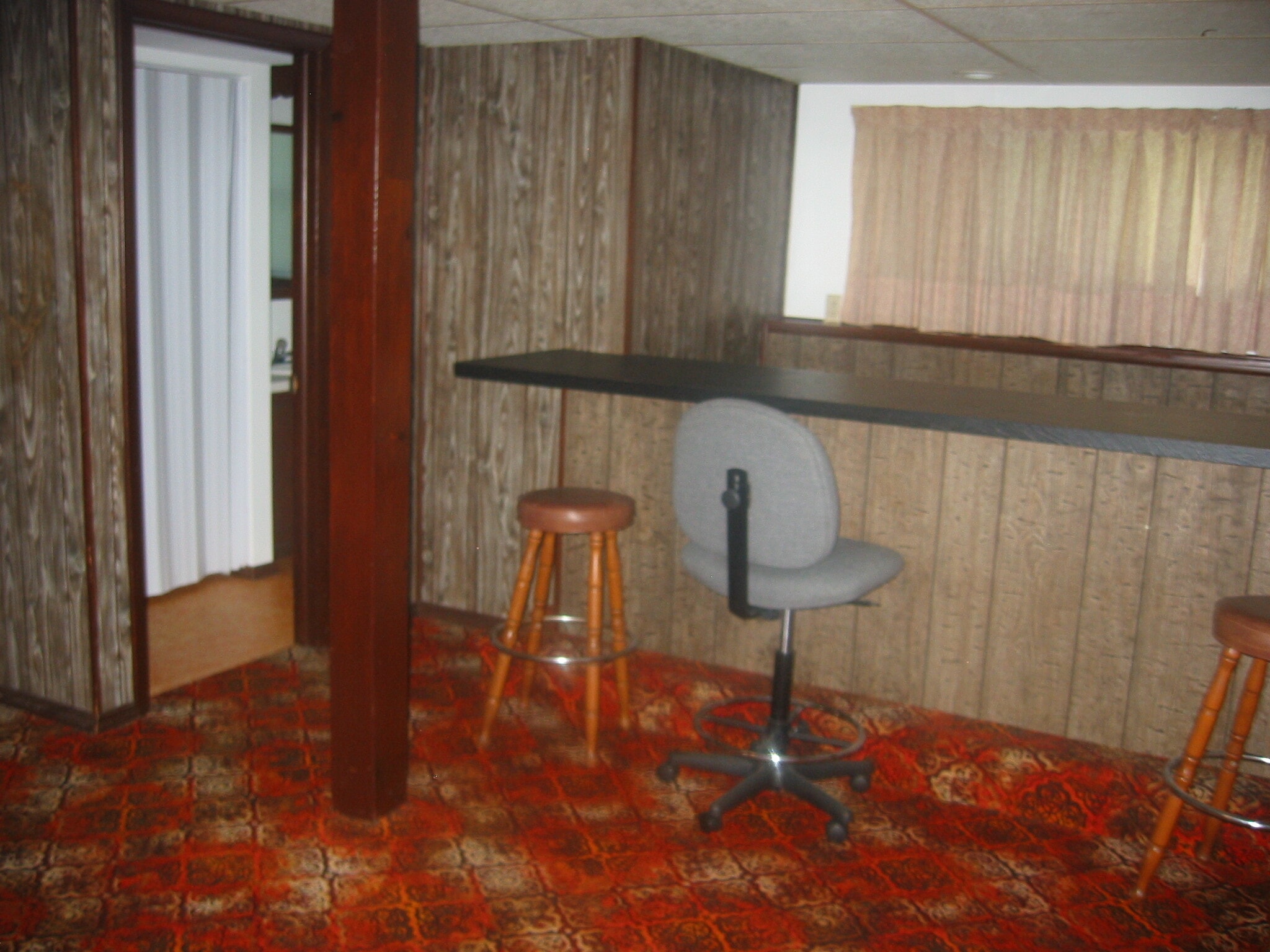 Family room adjacent to half bathroom - 8258 Larkspur Dr