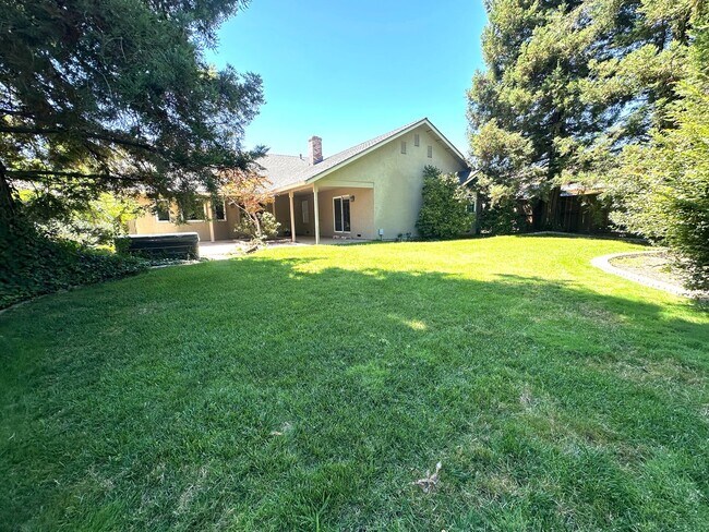 Building Photo - Beautiful 3-Bedroom Home with Open Floor Plan & Private Backyard