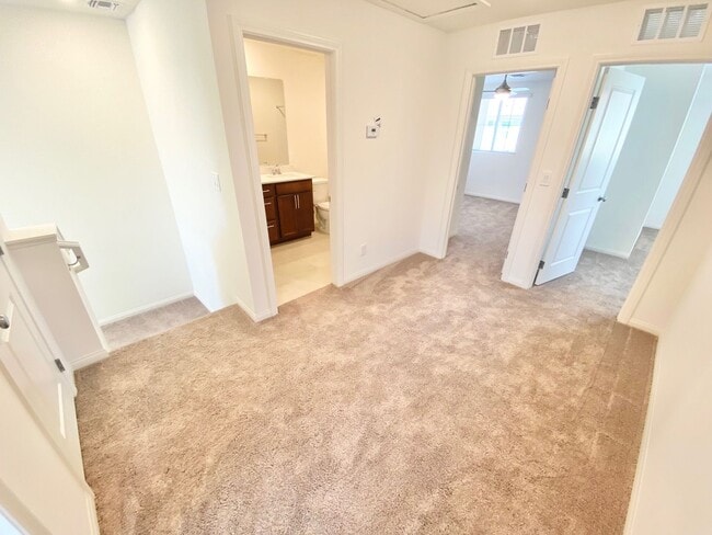 Building Photo - STUNNING BRAND NEW 3 BEDROOMS 2.5 BATHROOMS TWO STORY TOWNHOUSE WITH 2 CAR GARAGE