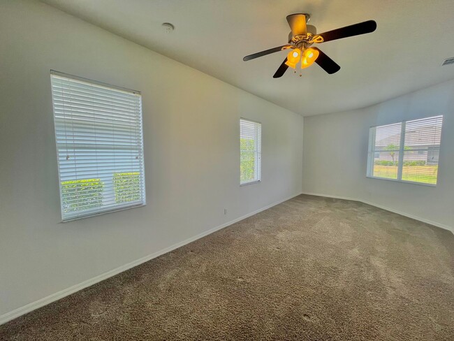 Building Photo - Spacious 4-Bed, 3-Bath Home in Guard-Gated...