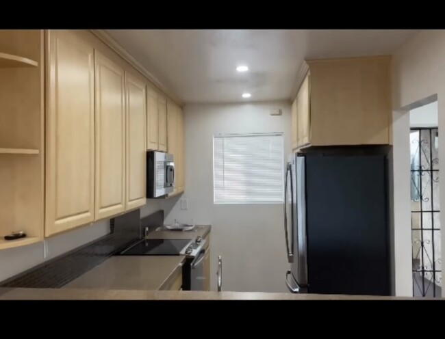 Kitchen with Fridge - 26051 Vermont Ave