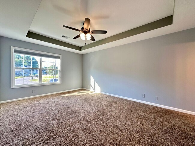 Building Photo - Spacious 3-Bedroom Home with Fenced Yard & Garage!