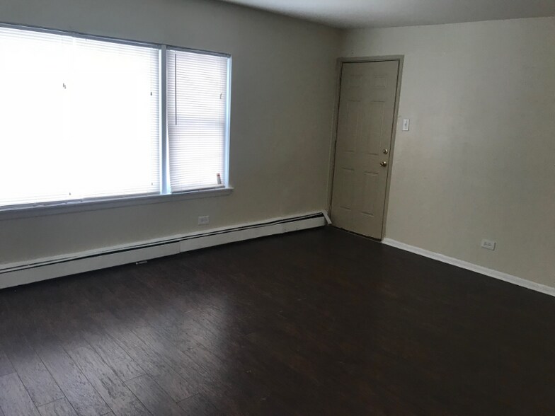 Building Photo - 6435-6437 S Evans Ave