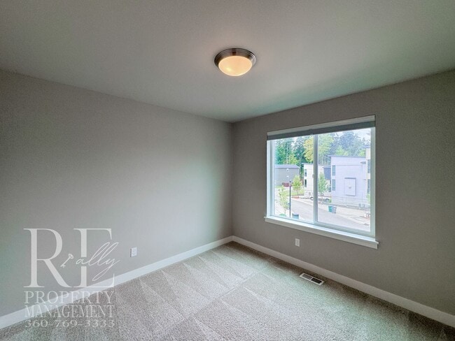 Building Photo - Modern 3-Story Bremerton Home with Water Views on Every Level