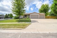 Building Photo - Spacious Ranch Home with 3-Car Garage, Finished Basement & Fenced Yard!