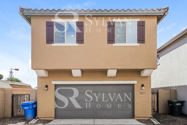 Building Photo - This home exudes a cheerful and welcoming charm!