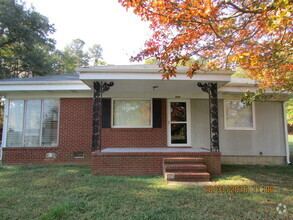 Building Photo - Available Now !!! Cute Brick Home With Sun...