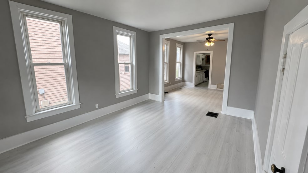 Living Room to Dining Room to Kitchen - 715 First St