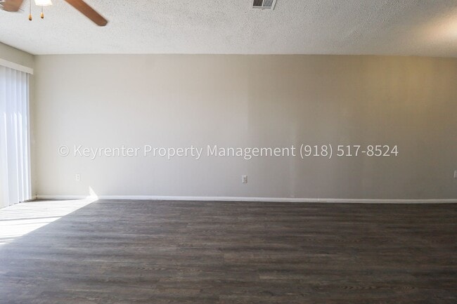 Building Photo - 6730 S Lewis Ave