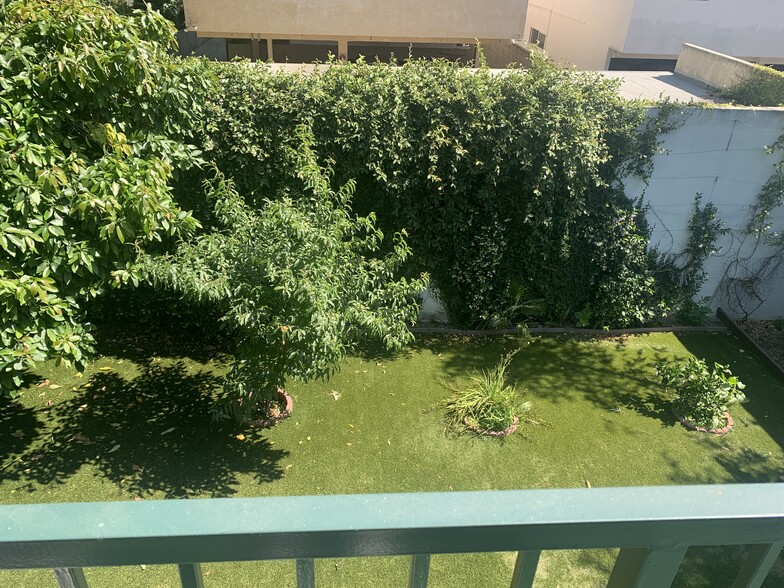 another view of your grassy back yard - 14715 Greenleaf St