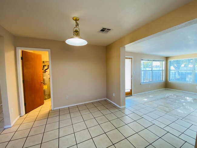 Building Photo - 4/2 Home with a backyard!