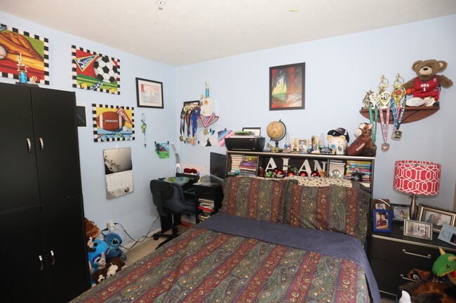 Building Photo - Available -Spacious 2 Car Garaged Townhome...