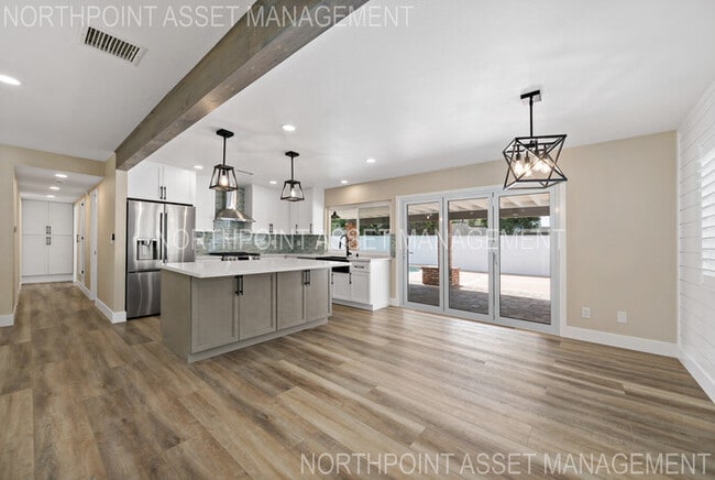 Building Photo - Brand New Remodel – Stunning Pool Home wit...