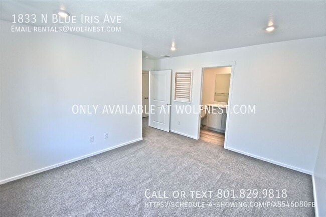 Building Photo - 1833 N Blue Iris Ave