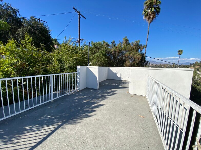 Rooftop deck with sweeping views of the Montecito Heights Hills and the San Gabriel Mountains - 4435 Radium Dr