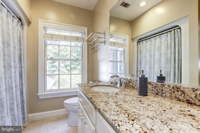 Building Photo - 9909 Avenel Farm Dr