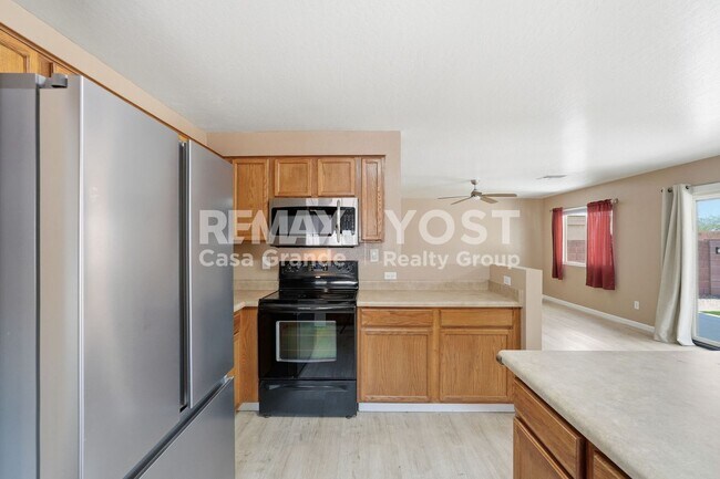 Building Photo - Bright Open Spaces & a Backyard You'll Love