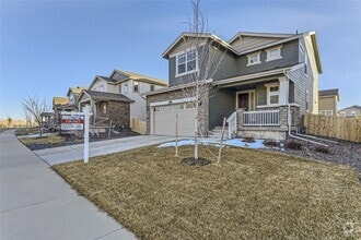 Building Photo - Stunning New Build in Aurora with Sleek Fi...