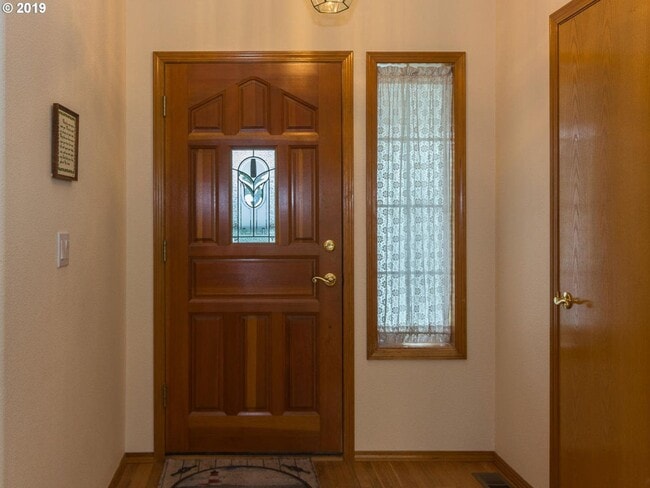 Building Photo - Charming 4-Bed, 2-Bath Home with Vaulted Ceilings, Dual Fireplaces & Serene Outdoor Spaces