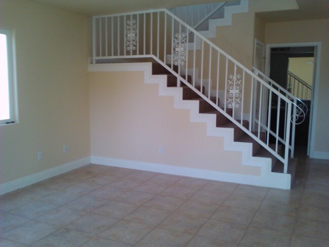 Stairs to second floor - 454 E 47th St